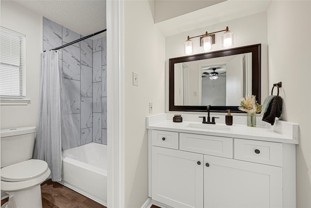 4005 Stoneybrook St, Baytown, TX 77521 - full bath featuring vanity, shower / bath combination with curtain, ceiling fan, wood finished floors, and a textured ceiling