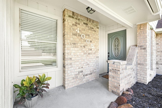 4005 Stoneybrook St, Baytown, TX 77521 - property entrance featuring brick siding and covered porch