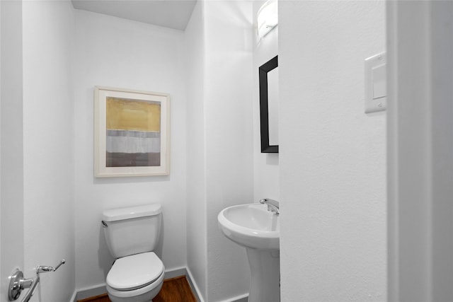 2310 Arabelle St, Houston, TX 77007 - full bath featuring toilet and wood finished floors