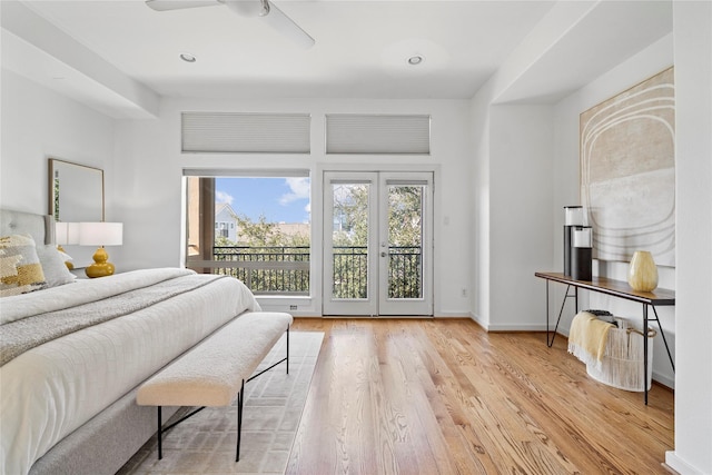 2310 Arabelle St, Houston, TX 77007 - bedroom featuring multiple windows, wood finished floors, access to exterior, and ceiling fan