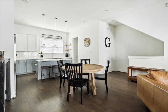 2212 Mcgowen St, Houston, TX 77004 - dining area featuring dark wood-style flooring