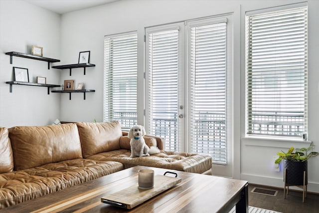 2212 Mcgowen St, Houston, TX 77004 - living room featuring healthy amount of natural light and wood finished floors