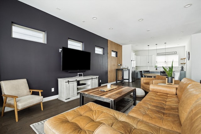 2212 Mcgowen St, Houston, TX 77004 - living room featuring dark wood-style flooring and recessed lighting