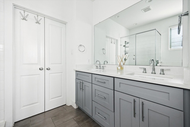 2212 Mcgowen St, Houston, TX 77004 - bathroom featuring double vanity and a stall shower