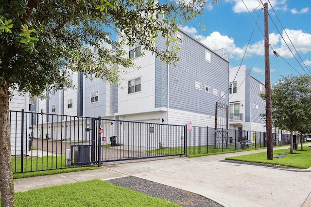 2212 Mcgowen St, Houston, TX 77004 - view of building exterior featuring driveway