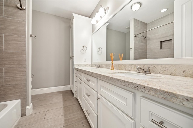 1346 Thornton Rd, Houston, TX 77018 - bathroom with double vanity, a tile shower, and a bathtub