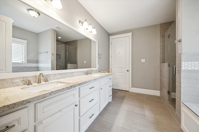 1346 Thornton Rd, Houston, TX 77018 - full bath featuring a shower stall and double vanity