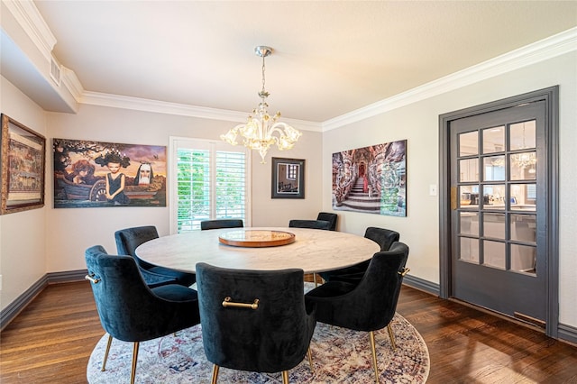3217 Parkwood Dr, Houston, TX 77021 - dining area featuring a chandelier, dark wood-style flooring, and ornamental molding