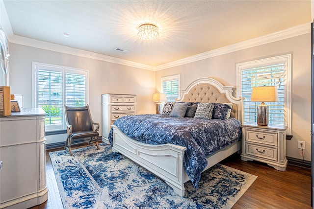 3217 Parkwood Dr, Houston, TX 77021 - bedroom featuring ornamental molding and dark wood-style floors