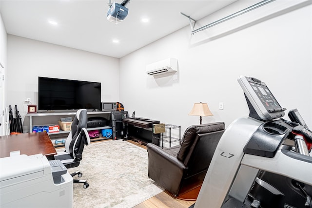 3217 Parkwood Dr, Houston, TX 77021 - office with a wall mounted AC, light wood-style floors, recessed lighting, and a garage