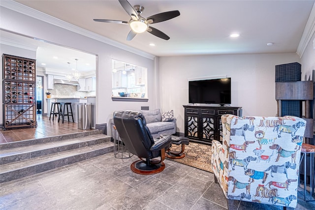 3217 Parkwood Dr, Houston, TX 77021 - living room with crown molding, recessed lighting, and a ceiling fan