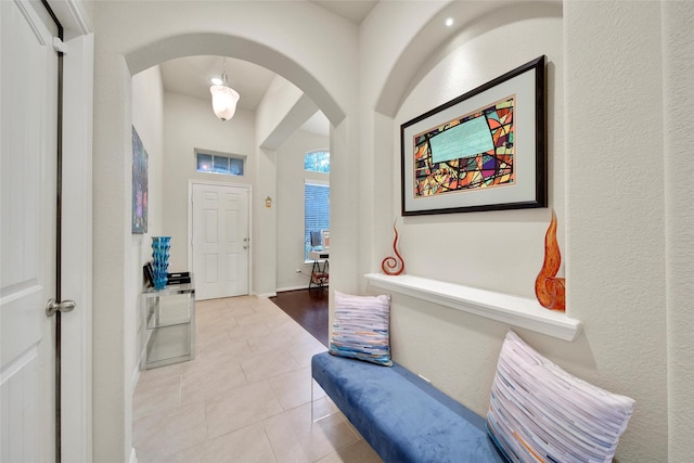 22223 Ebbets Field Dr, Spring, TX 77389 - entryway featuring arched walkways and tile patterned floors