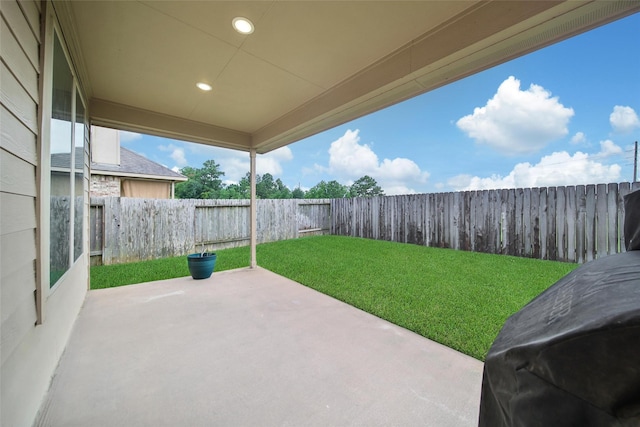 22223 Ebbets Field Dr, Spring, TX 77389 - fenced backyard with a patio