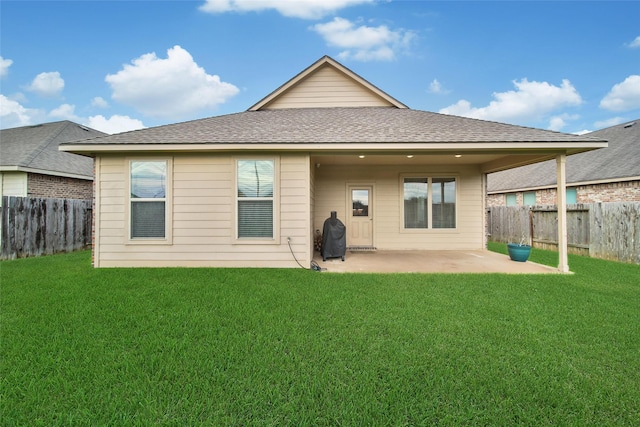 22223 Ebbets Field Dr, Spring, TX 77389 - rear view of property with a patio area, a fenced backyard, and roof with shingles