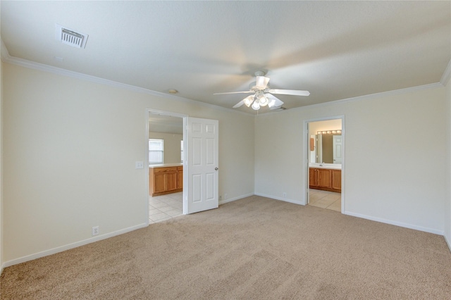 20218 Cypresswood Gln, Spring, TX 77373 - unfurnished bedroom featuring light carpet, ensuite bathroom, crown molding, and ceiling fan