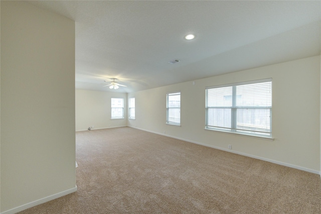 20218 Cypresswood Gln, Spring, TX 77373 - unfurnished room featuring light carpet, ceiling fan, and recessed lighting
