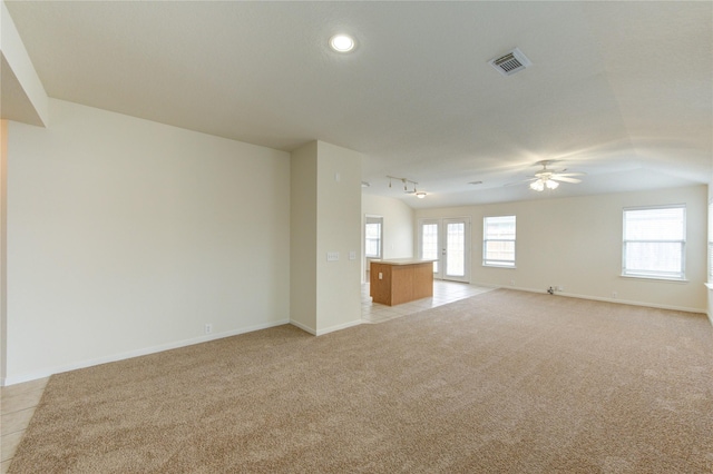 20218 Cypresswood Gln, Spring, TX 77373 - unfurnished living room with ceiling fan, light colored carpet, and recessed lighting