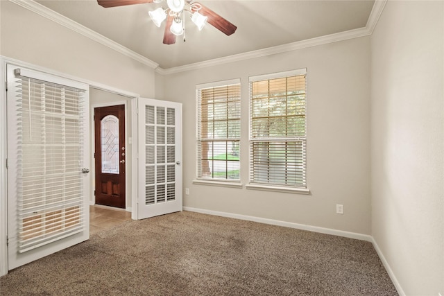 187 Black Swan Pl, The Woodlands, TX 77354 - carpeted foyer entrance with ceiling fan and ornamental molding