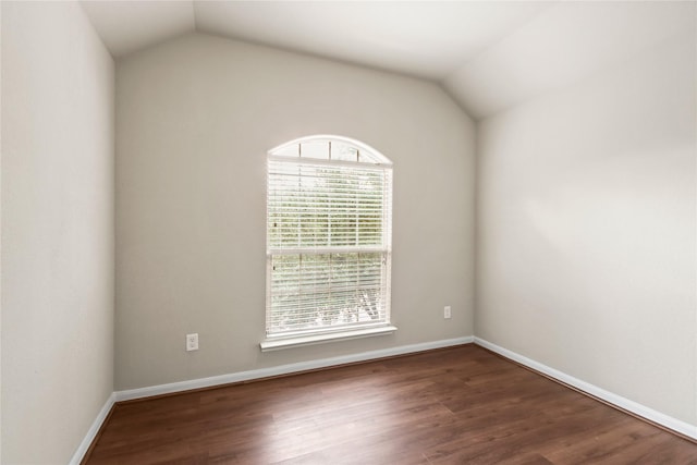 187 Black Swan Pl, The Woodlands, TX 77354 - empty room featuring lofted ceiling and wood finished floors