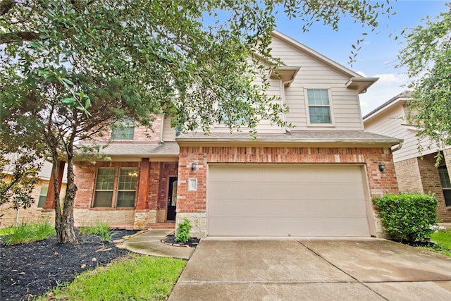 187 Black Swan Pl, The Woodlands, TX 77354 - traditional-style home with concrete driveway, a garage, and brick siding