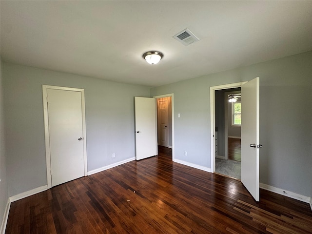 14410 Henry Rd, Houston, TX 77060 - unfurnished bedroom featuring wood finished floors