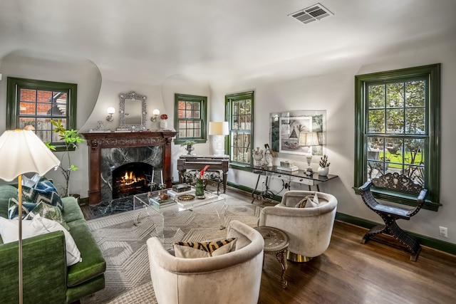2248 Robinhood St, Houston, TX 77005 - living area with wood finished floors, a fireplace, and healthy amount of natural light