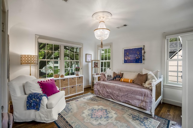 2248 Robinhood St, Houston, TX 77005 - bedroom featuring wood finished floors and multiple windows