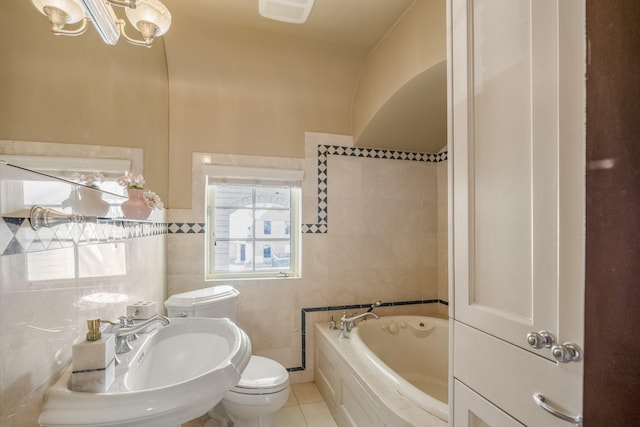 2248 Robinhood St, Houston, TX 77005 - full bathroom with a bath, tile walls, tile patterned floors, and a chandelier