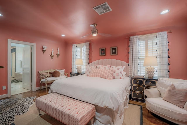 2248 Robinhood St, Houston, TX 77005 - bedroom featuring multiple windows, recessed lighting, wood finished floors, ensuite bath, and a ceiling fan