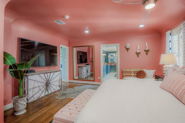 2248 Robinhood St, Houston, TX 77005 - bedroom with wood finished floors, recessed lighting, and ensuite bathroom
