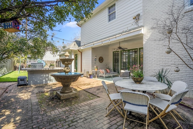 2248 Robinhood St, Houston, TX 77005 - view of patio / terrace with a ceiling fan and outdoor dining area