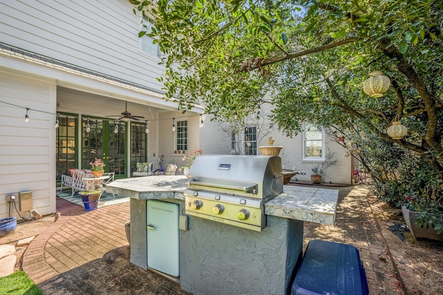 2248 Robinhood St, Houston, TX 77005 - view of patio with ceiling fan and exterior kitchen
