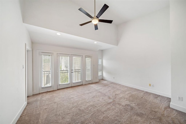 4707 Caroline St, Houston, TX 77004 - empty room with carpet, french doors, a ceiling fan, recessed lighting, and high vaulted ceiling