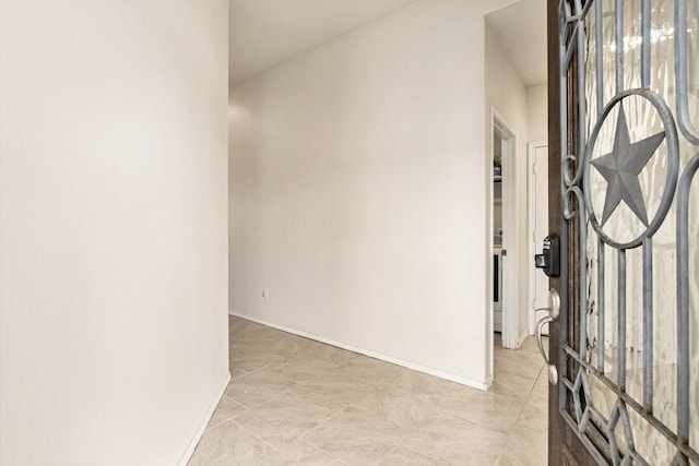 23719 Scotsman Dr, Katy, TX 77493 - foyer entrance featuring baseboards and light tile patterned floors