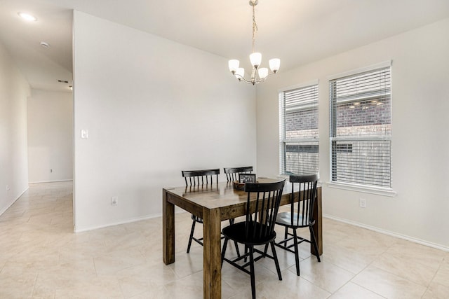 23719 Scotsman Dr, Katy, TX 77493 - dining space featuring a chandelier and light tile patterned flooring