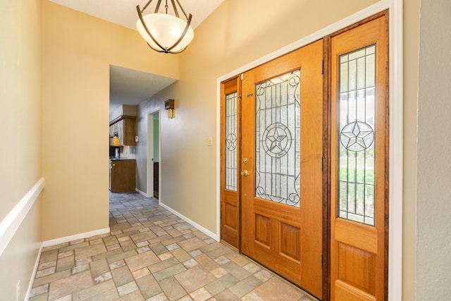 108 Laurel Valley Dr, West Columbia, TX 77486 - foyer entrance with baseboards and light stone finish floors