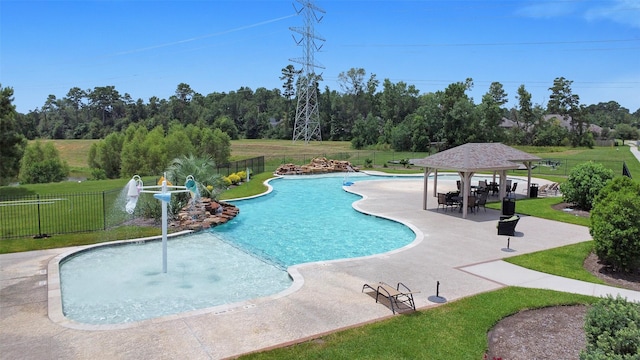 12806 Durham Creek Ln, Tomball, TX 77375 - community pool with a gazebo and a patio area