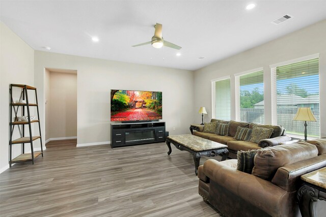 12806 Durham Creek Ln, Tomball, TX 77375 - living area with a ceiling fan, light wood-style floors, and recessed lighting
