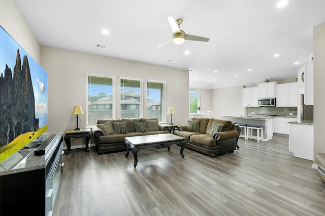 12806 Durham Creek Ln, Tomball, TX 77375 - living area with ceiling fan, light wood-style flooring, and recessed lighting