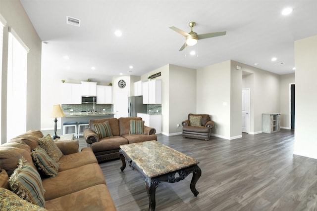 12806 Durham Creek Ln, Tomball, TX 77375 - living area featuring wood finished floors, ceiling fan, and recessed lighting