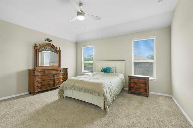 12806 Durham Creek Ln, Tomball, TX 77375 - carpeted bedroom with baseboards and ceiling fan