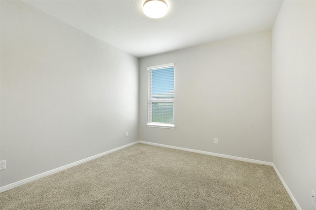 12806 Durham Creek Ln, Tomball, TX 77375 - spare room with light colored carpet