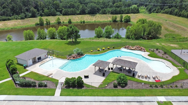 12806 Durham Creek Ln, Tomball, TX 77375 - community pool with a water view and a patio