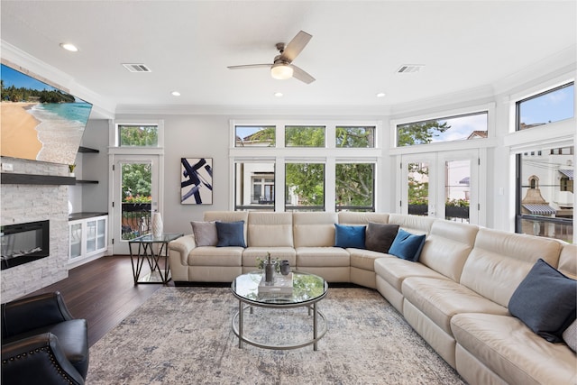 802 Malone St Unit A, Houston, TX 77007 - living room with crown molding, ceiling fan, dark wood finished floors, a fireplace, and recessed lighting