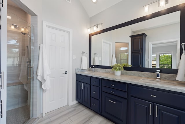 802 Malone St Unit A, Houston, TX 77007 - full bath with vaulted ceiling, double vanity, and a stall shower