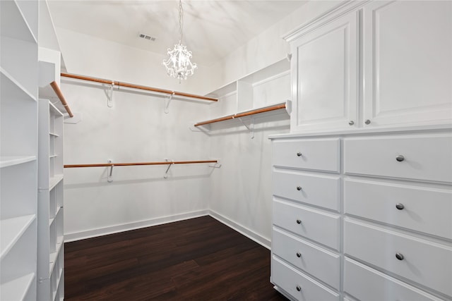 802 Malone St Unit A, Houston, TX 77007 - spacious closet with dark wood-style flooring and a chandelier