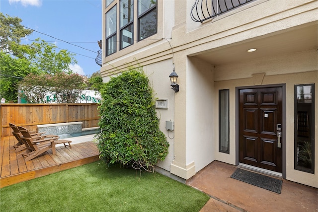 802 Malone St Unit A, Houston, TX 77007 - property entrance featuring stucco siding and a deck