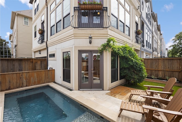 802 Malone St Unit A, Houston, TX 77007 - rear view of property with french doors, a fenced backyard, and stucco siding