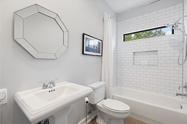 802 Malone St Unit A, Houston, TX 77007 - full bath with shower / bath combination with curtain and wood finished floors