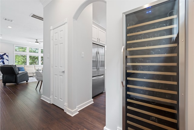 802 Malone St Unit A, Houston, TX 77007 - hall with beverage cooler, dark wood-style flooring, arched walkways, and recessed lighting